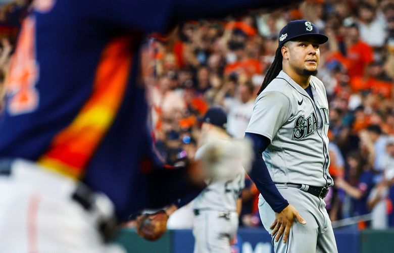 Starting pitcher Luis Castillo reacts as Yordan Alvarez rounds the bases on a two-run homer to pull the Astros ahead 3-2 in the sixth inning as the Seattle Mariners played the Houston Astros in Game 2 of the American League Division Series Thursday, Oct. 13, 2022 at Minute Maid Park, in Houston, TX. 221848 221848