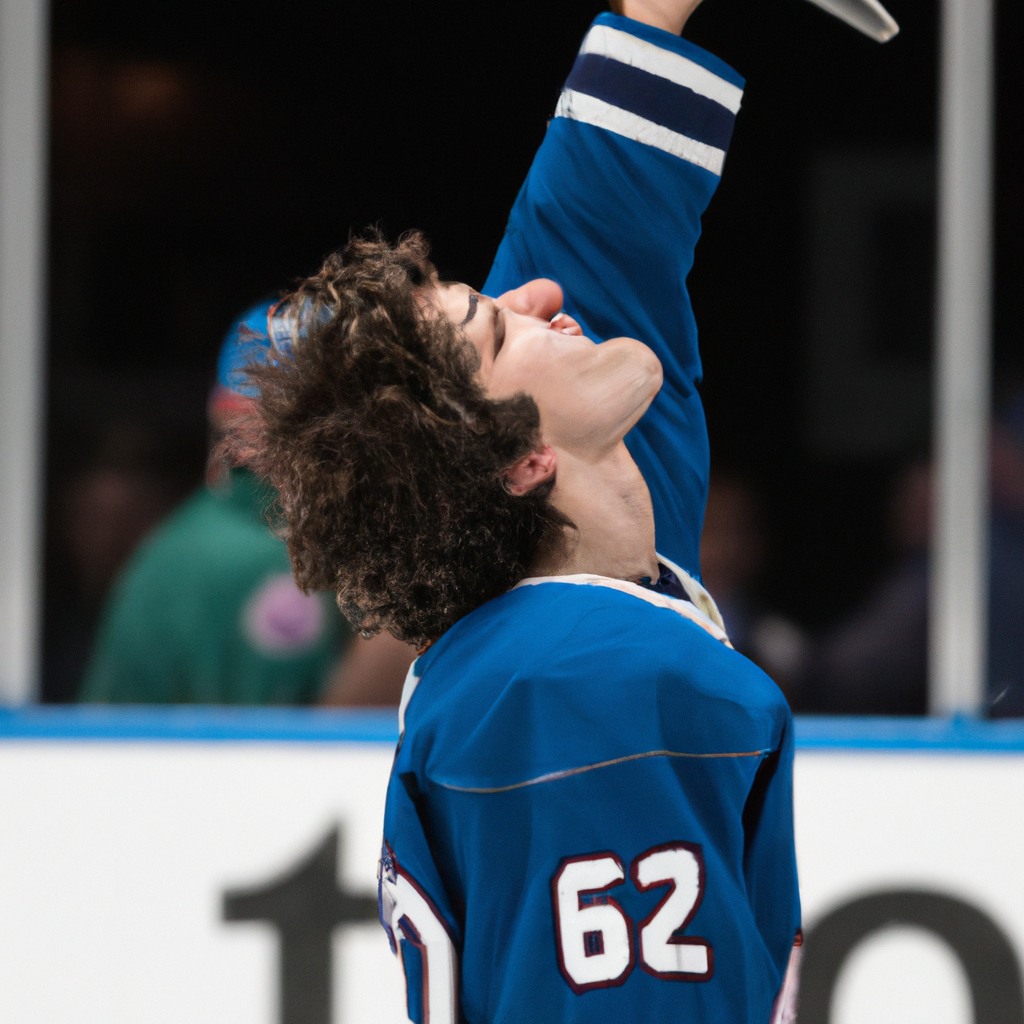 Brandon Tanev of the Kraken Blows Kiss to Avalanche Crowd After Scoring Goal in Game 2