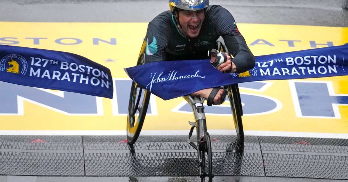Wheelchair Racer Hug Claims 6th Boston Marathon Victory