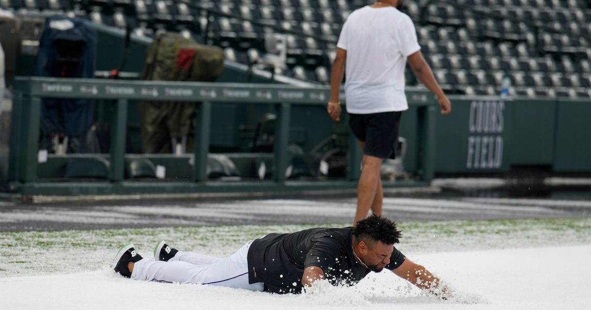 Coors Field Transformed into Winter Wonderland by Pea-Sized Hail Ahead of Dodgers Game