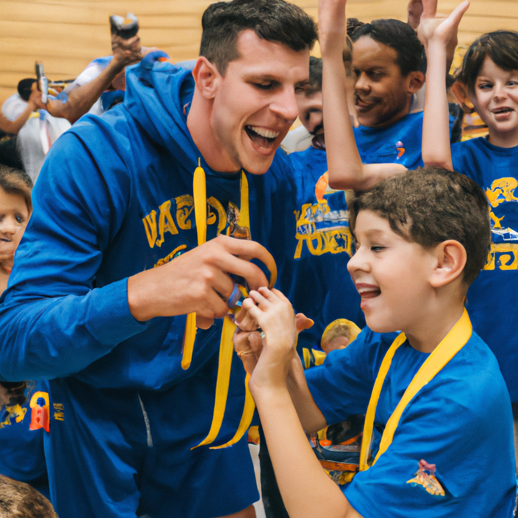 Former Golden State Warriors Players Bjelica and Chiozza Receive Championship Rings at Youth Campers' Presentation