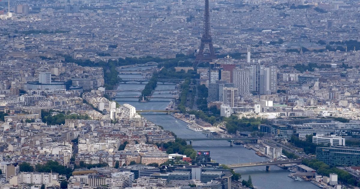 Paris Olympic Swimming Test Delayed by Rainfall