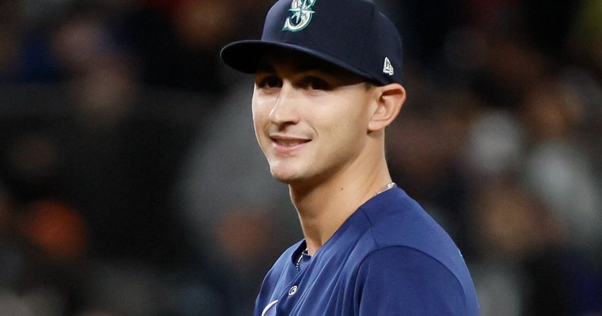 George Kirby of the Seattle Mariners Surprised by Ball Thrown Back at Him from Stands During Mound Appearance
