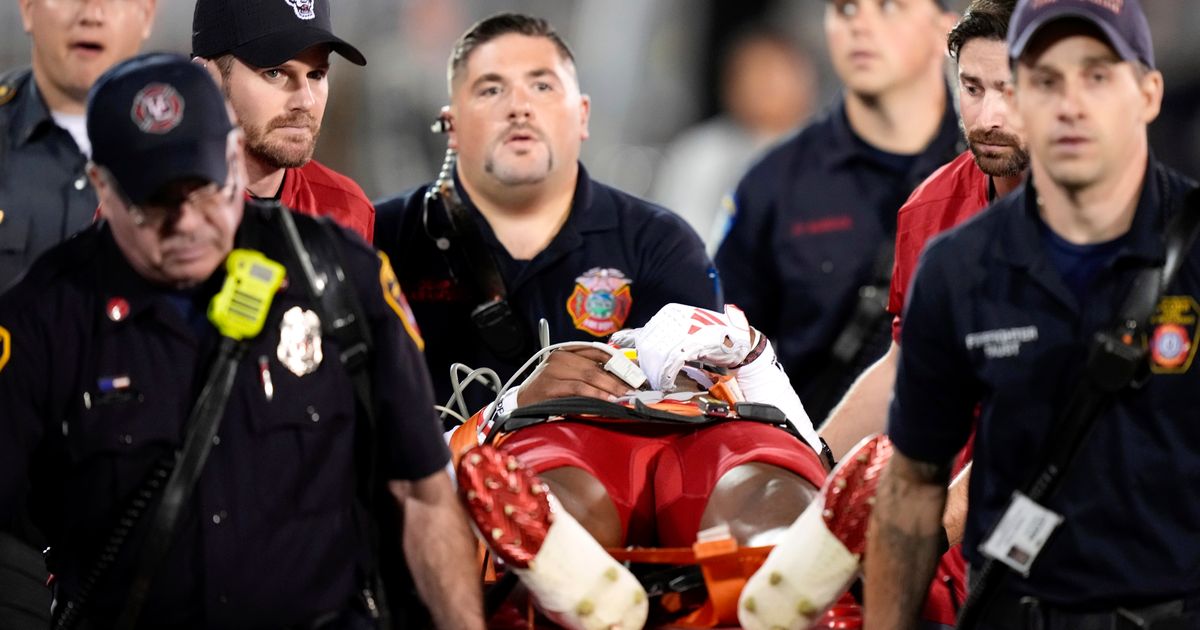 North Carolina State's Ashford Injured and Removed from Field on Stretcher During Opener at UConn