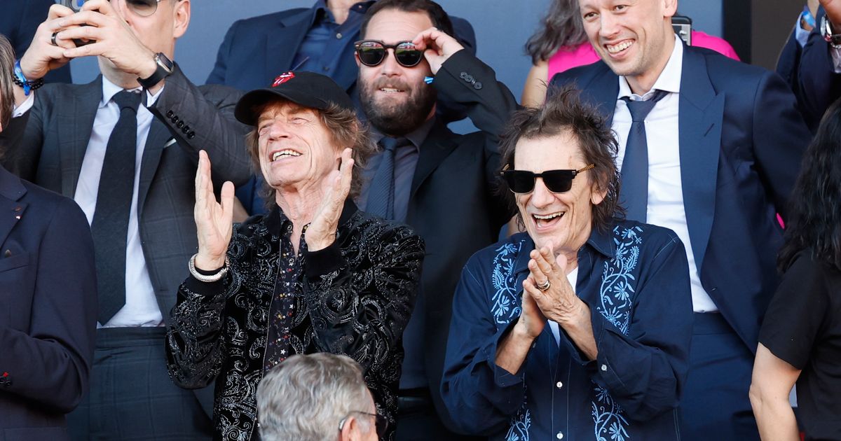 Mick Jagger Attends Barcelona vs. Real Madrid Soccer Match Featuring Stones Logo on Barcelona Uniforms