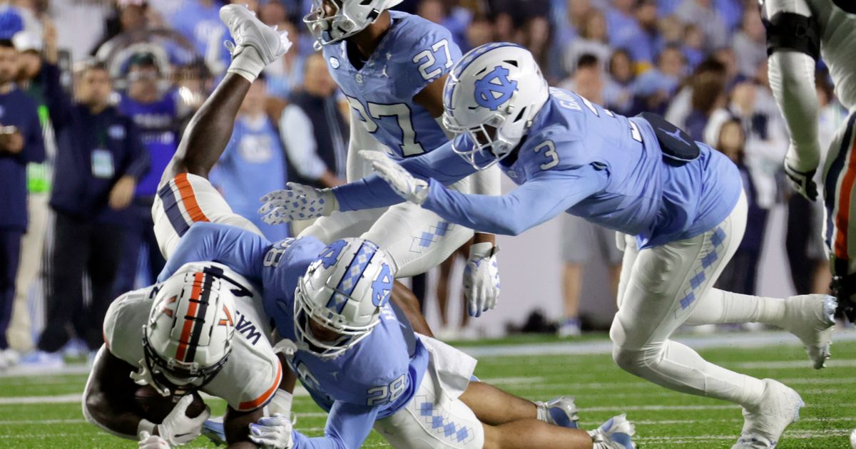 Virginia Defeats No. 10 North Carolina 31-27 with Help from Mike Hollins and Malik Washington