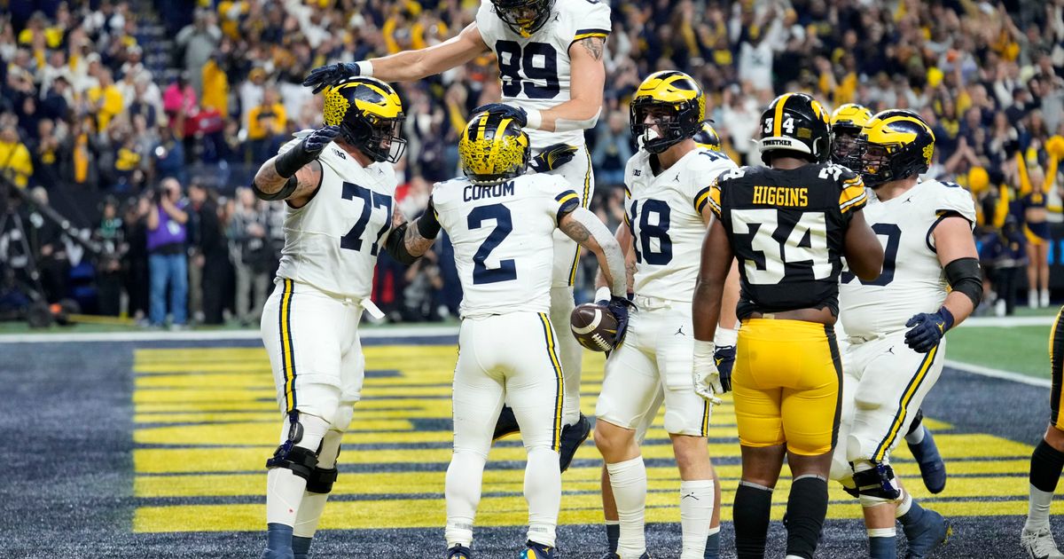 Michigan Wolverines Secure Big Ten Title with 26-20 Win Over Iowa Hawkeyes, Likely to Receive Top Playoff Seed