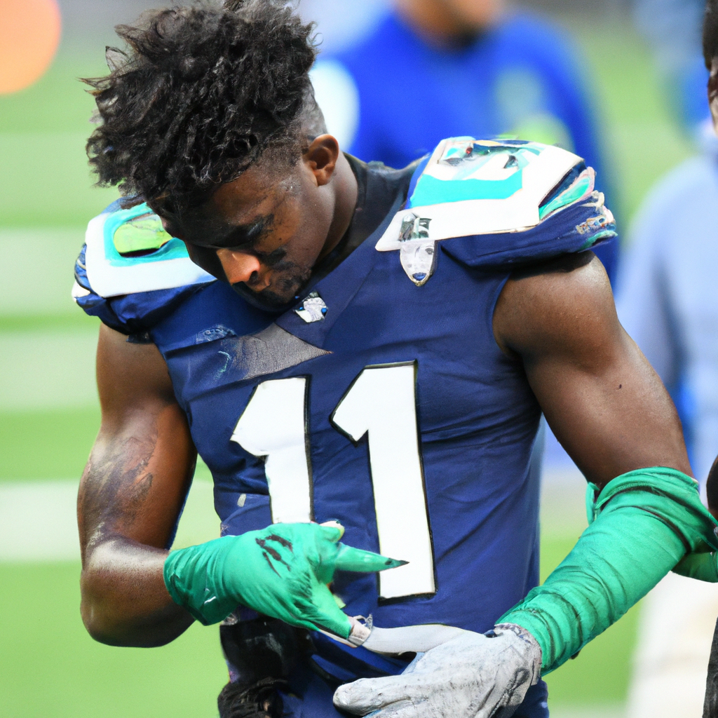 Seattle Seahawks Wide Receiver DK Metcalf Misses Practice Thursday Due to Back Injury